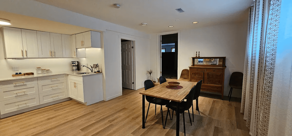 Dining area and kitchenette inside Naramata vineyard vacation suite